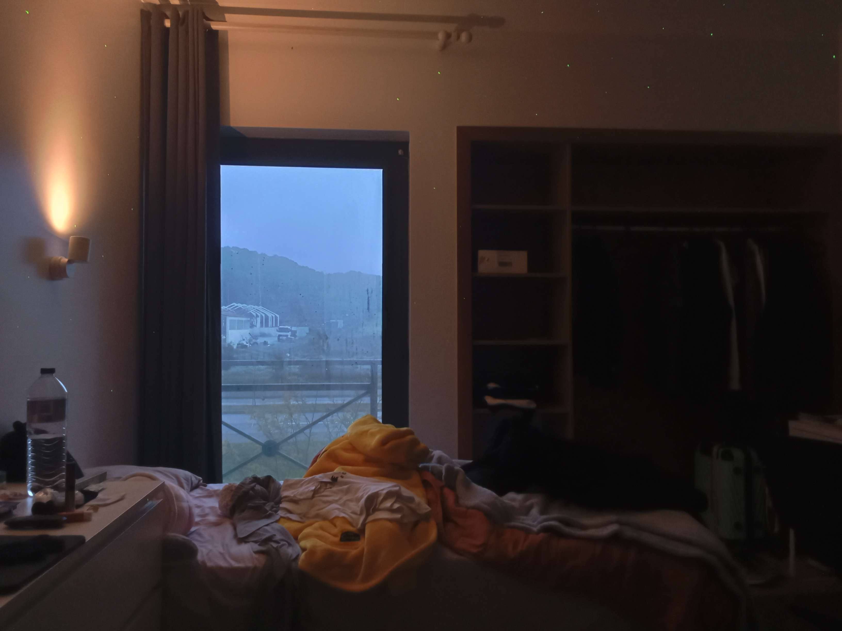 the view from inside my uni dorm, with my lovely roommate's messy bed in full view. i love that guy, if you're readin this, shout out my fellow beloved gay
